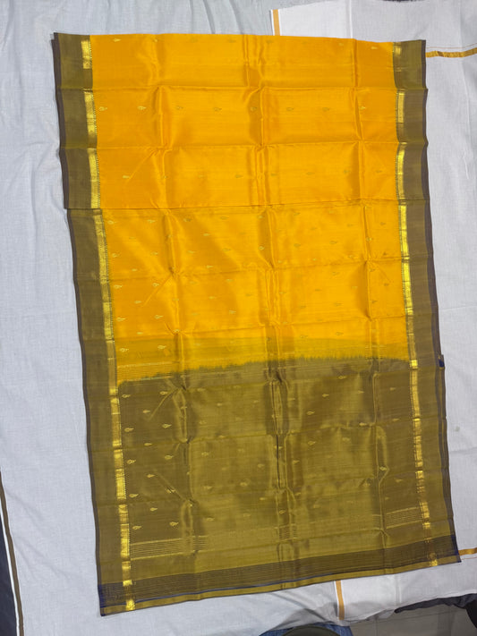 Kanchivaram Soft silk yellow saree with small border