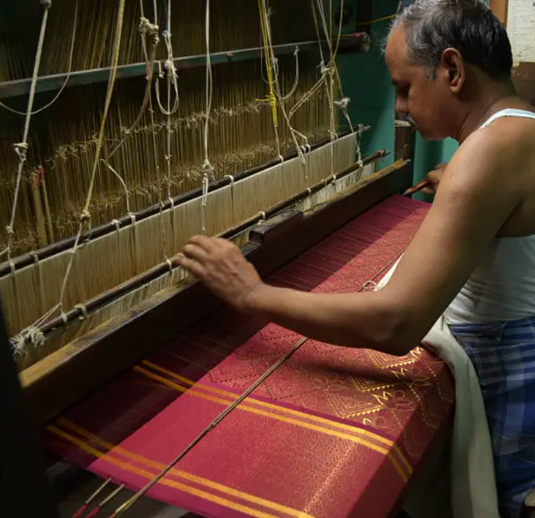 Artisan weaving silk saree