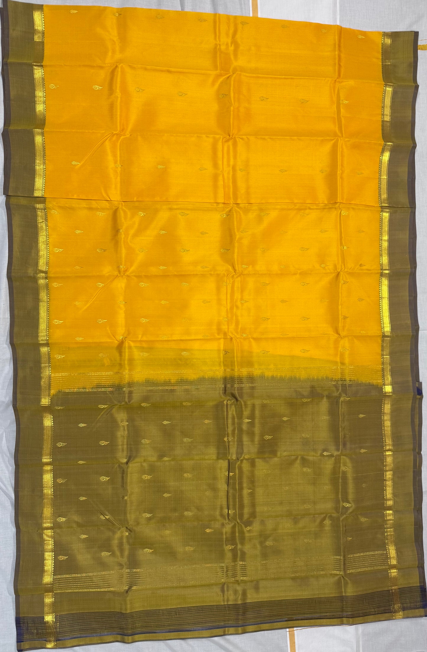 Kanchivaram  Soft silk yellow saree with small border