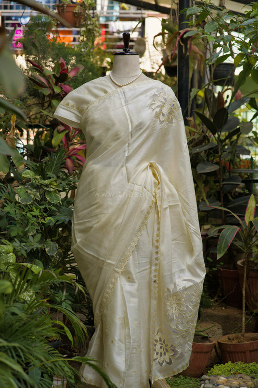 White Tussar Saree with Aplique work