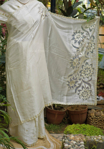 White Tussar Saree with Aplique work